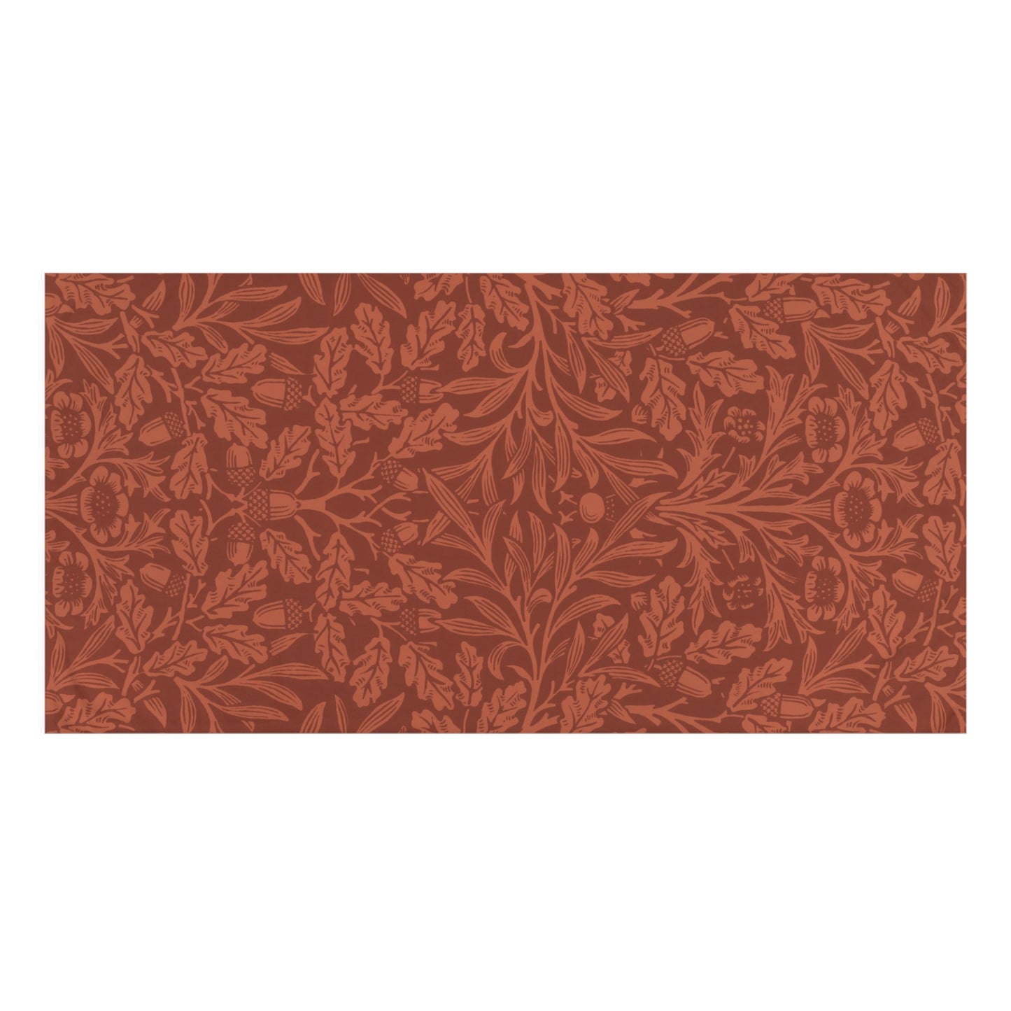 A rectangular textile or mat featuring an all-over botanical pattern in terracotta and rust tones, shown flat against a plain white background.