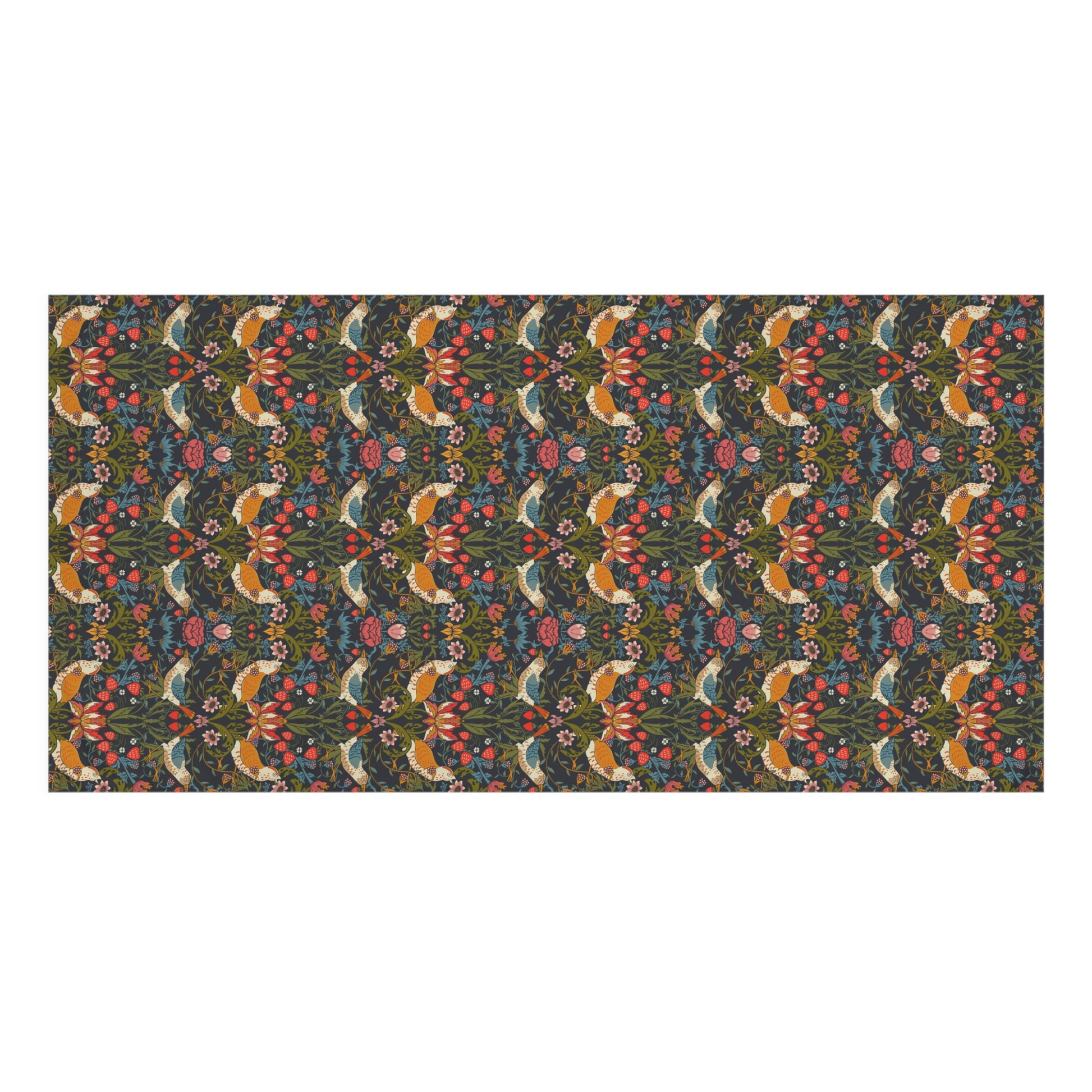A rectangular bath towel with a dense, symmetrical floral and botanical pattern in dark green, rust orange, pink, and cream, shown flat against a plain white background.