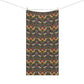 A rectangular towel featuring a dense, symmetrical Art Nouveau pattern with birds, flowers, and foliage in muted teal, rust orange, pink, cream, and dark green tones, hanging from two wooden clothespins on a string against a plain white background.