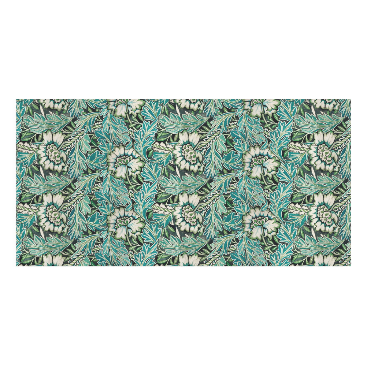 A rectangular bath towel with a dense botanical pattern featuring teal, green, and white flowers and leaves on a dark background, shown flat against a white backdrop.