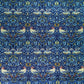 Patterned fabric with birds and floral designs on a blue background