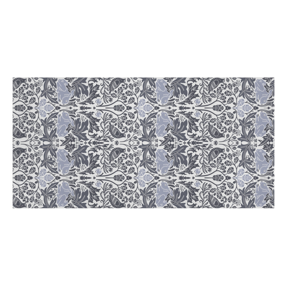 A rectangular bath towel featuring a repeating Victorian-style floral and leaf pattern in muted blue-gray, charcoal gray, and white.