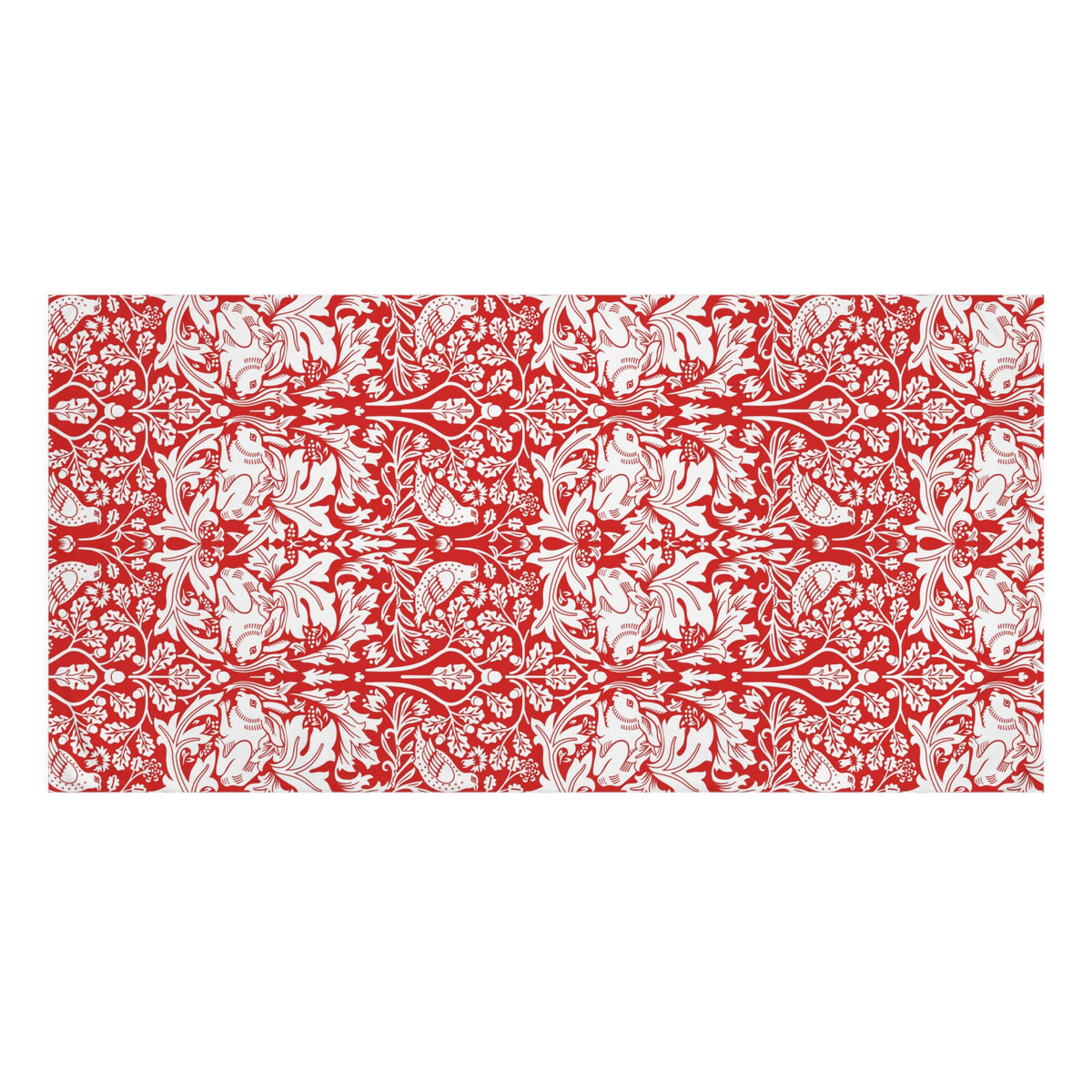 A rectangular bath towel with a repeating red and white floral damask pattern, shown flat against a plain white background.