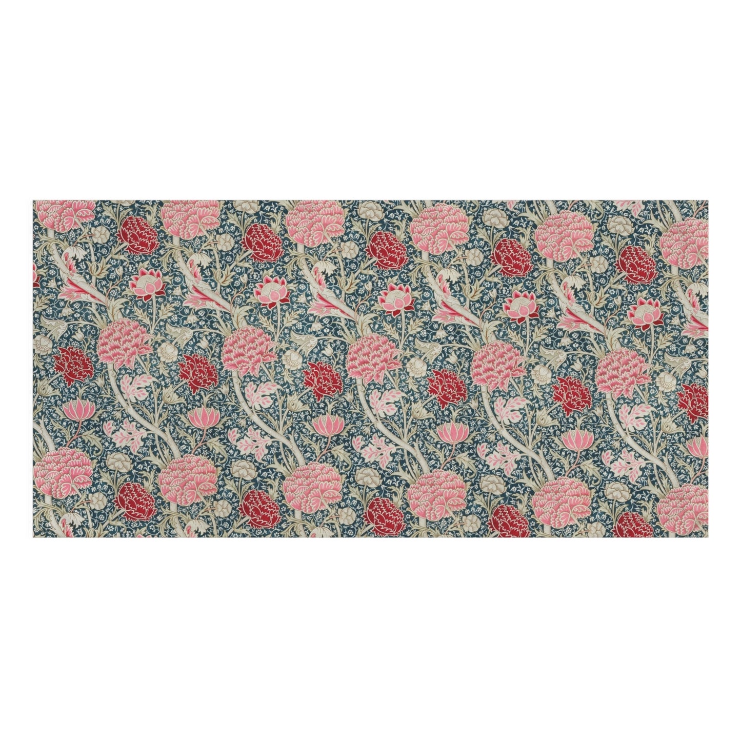 A rectangular towel featuring a dense floral and botanical pattern in pink, coral, cream, and muted blue on a white background.