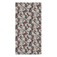 A rectangular bath towel featuring an intricate vintage floral and scroll pattern in navy blue, cream, coral, and muted green, shown flat against a white background.