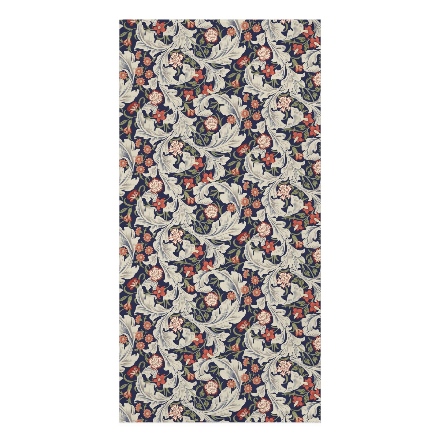 A rectangular bath towel featuring an intricate vintage floral and scroll pattern in navy blue, cream, coral, and muted green, shown flat against a white background.