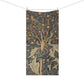 A rectangular textile hanging from a clothesline with two wooden clips, featuring a detailed vintage-style botanical illustration of an apple tree with birds and swirling foliage in muted blue-gray, olive green, beige, and rust tones.