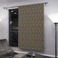 Patterned curtain hanging in a room with modern decor
