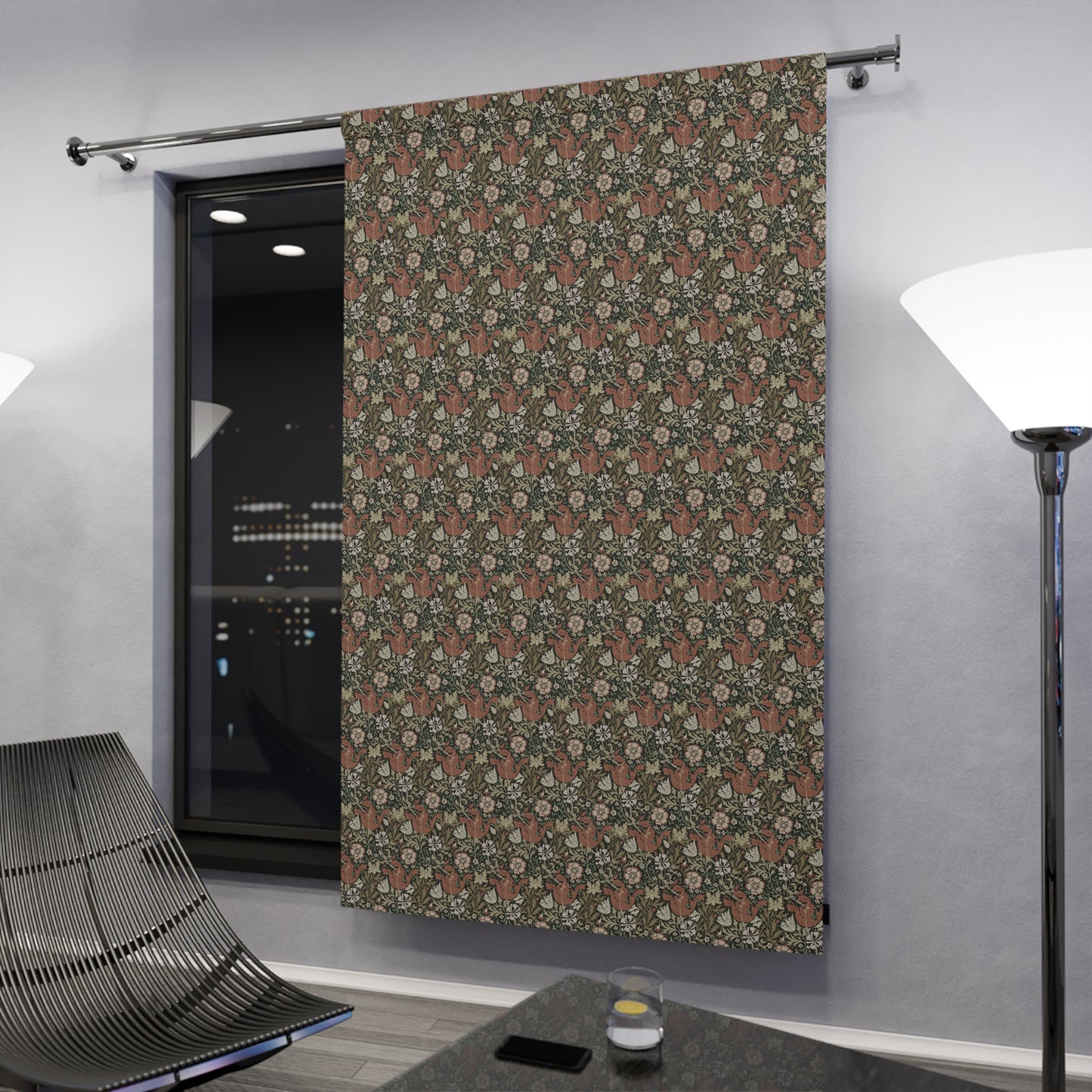 Patterned curtain hanging in a room with modern decor