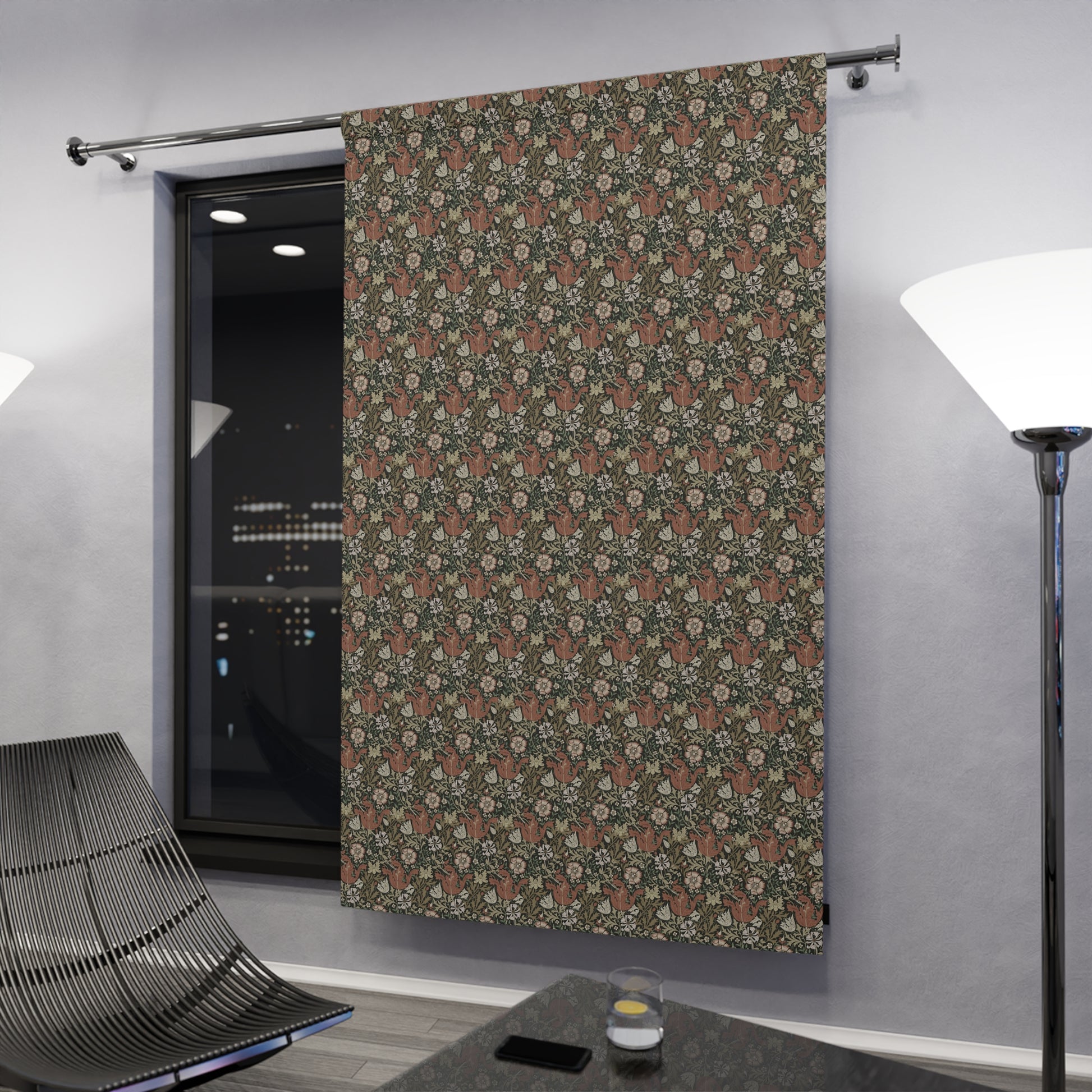 Patterned curtain hanging in a room with modern decor