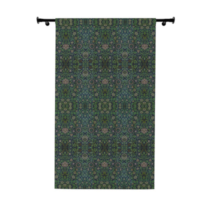 Decorative curtain with a green and blue pattern on a white background