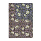 A rectangular blanket with a two-sided print featuring floral designs in shades of rosewood and lavender.
