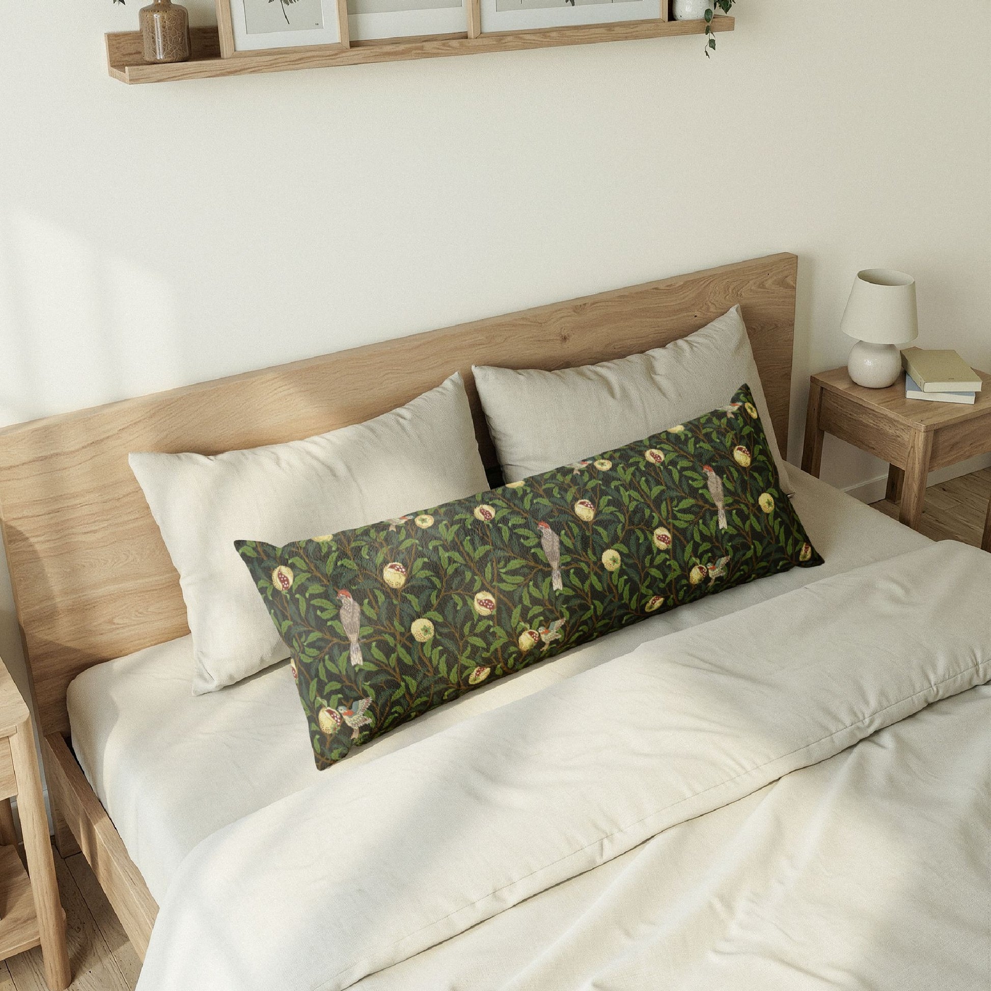 Bedroom with a wooden headboard and decorative pillows on a bed.