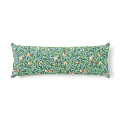 Decorative pillow with floral and bird pattern on a white background