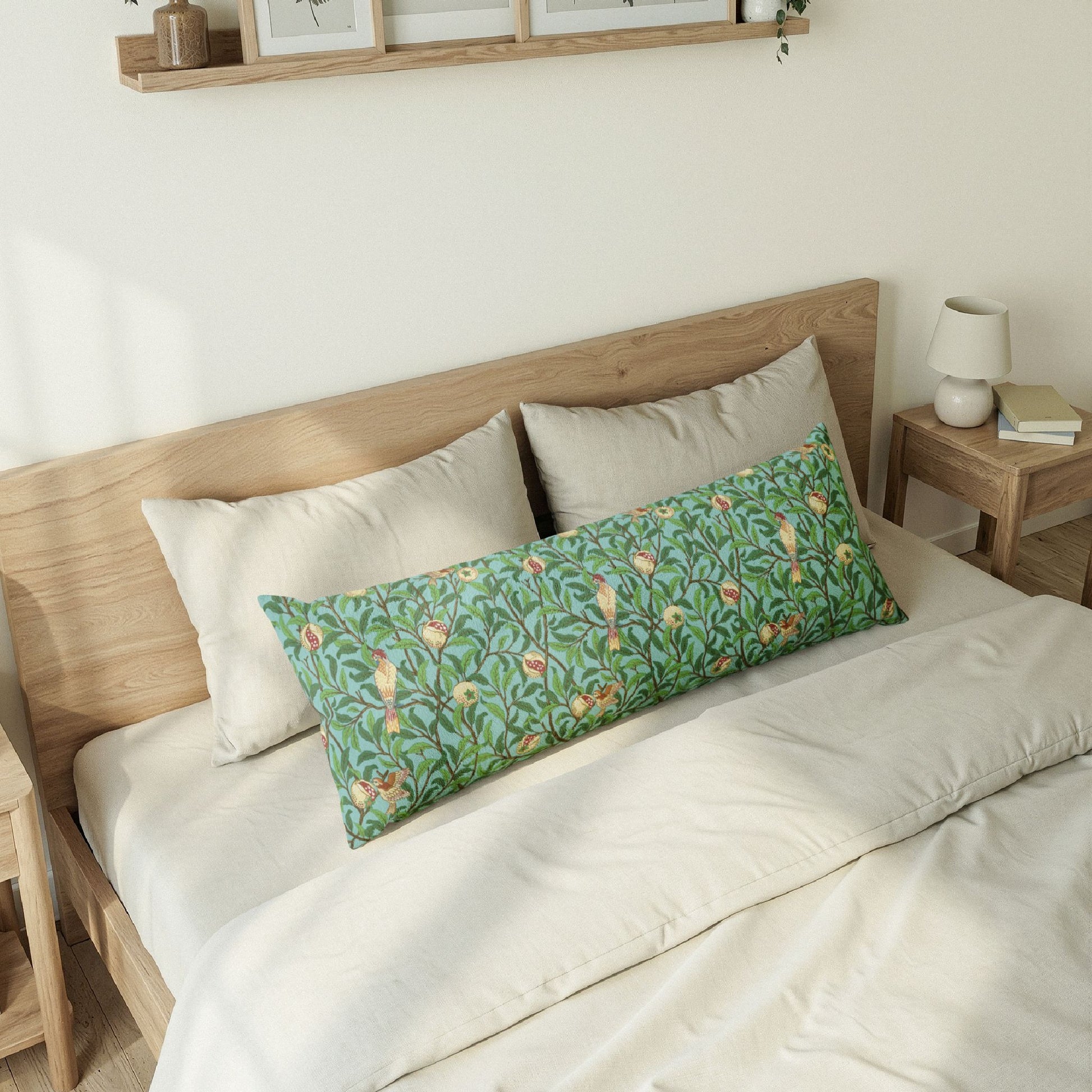 Bedroom with a wooden headboard and floral-patterned pillow