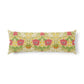 A long rectangular lumbar pillow featuring a vintage floral pattern with red poppies, green leaves, and yellow accents on a cream background, shown against a plain white studio backdrop.