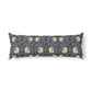 Long decorative pillow with floral pattern on a white background