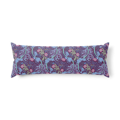 Decorative pillow with floral and dragon pattern on a white background