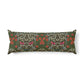 A long rectangular lumbar pillow featuring a dense floral pattern in olive green, red, pink, and cream, set against a plain white background.