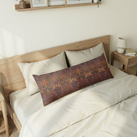 Bedroom with a wooden bed frame, white bedding, and a camouflage-patterned pillow.