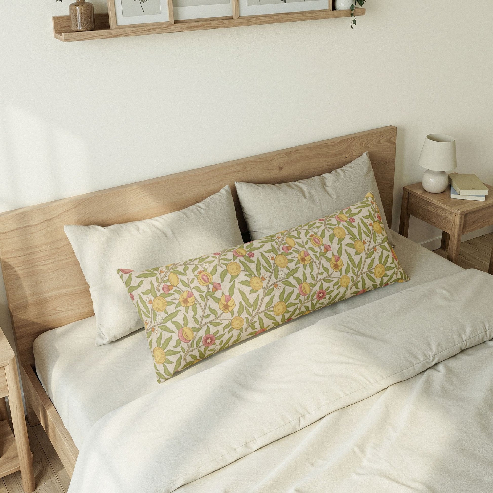 Bedroom with a wooden bed frame and decorative pillows