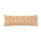 A rectangular lumbar pillow with a detailed orange and yellow damask pattern on a white background, shown against a plain white studio backdrop.