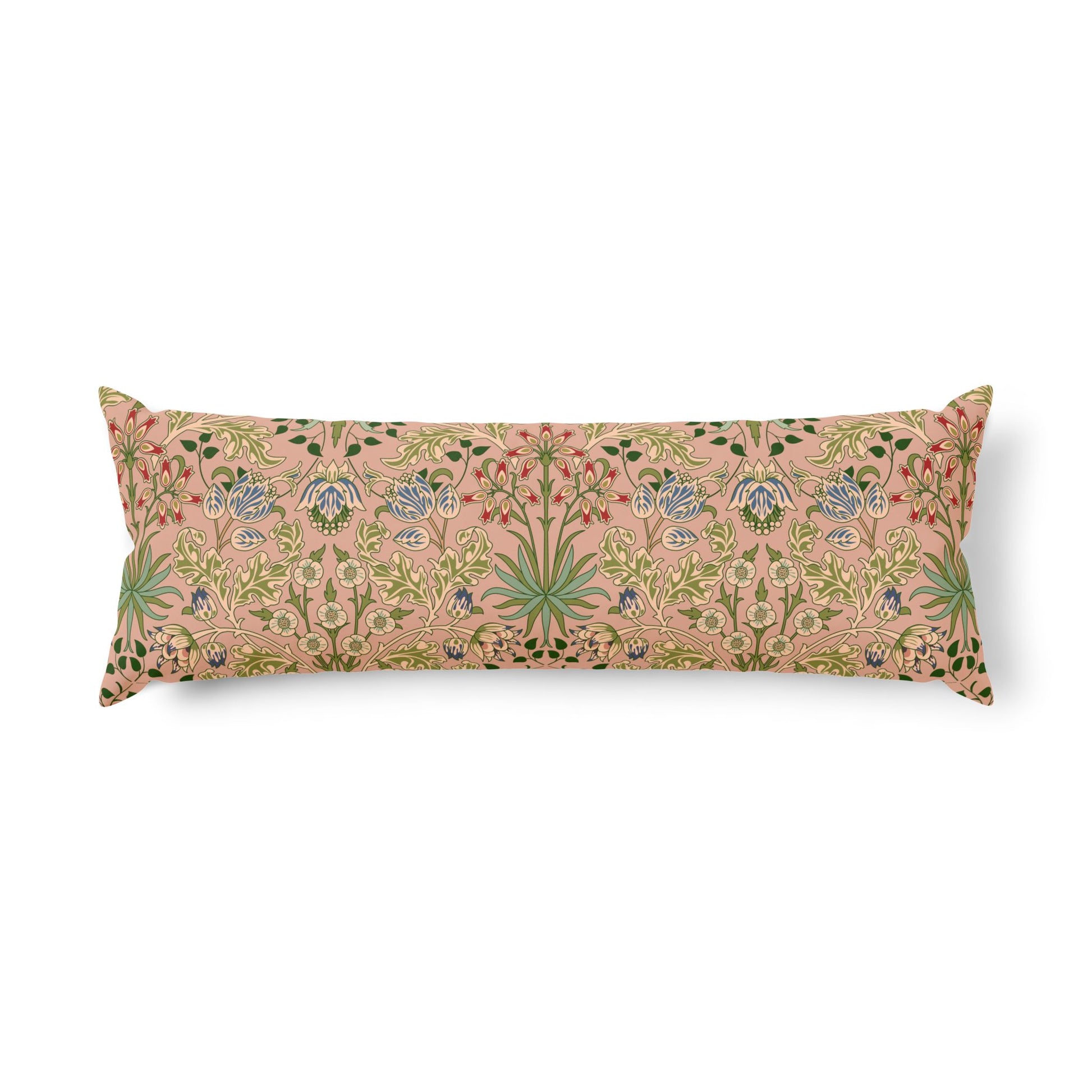 A long rectangular lumbar pillow featuring a dense, vintage botanical pattern in muted green, blue, and gold on a dusty pink background, shown against a plain white studio background.