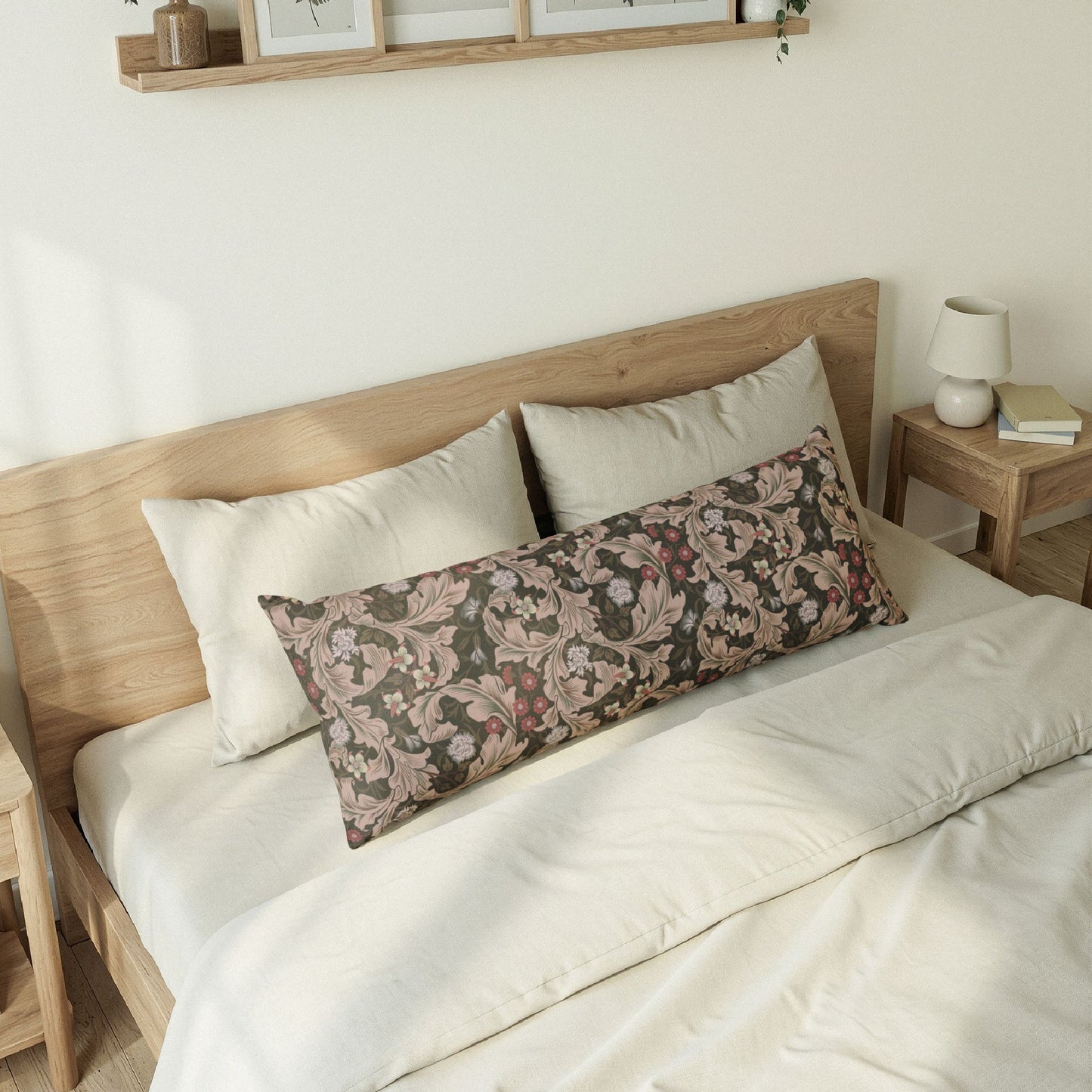 Bedroom with wooden bed frame, white bedding, and floral-patterned pillow.