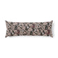 Brown cylindrical pillow on a beige background
