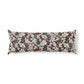 Decorative pillow with floral pattern on a white background