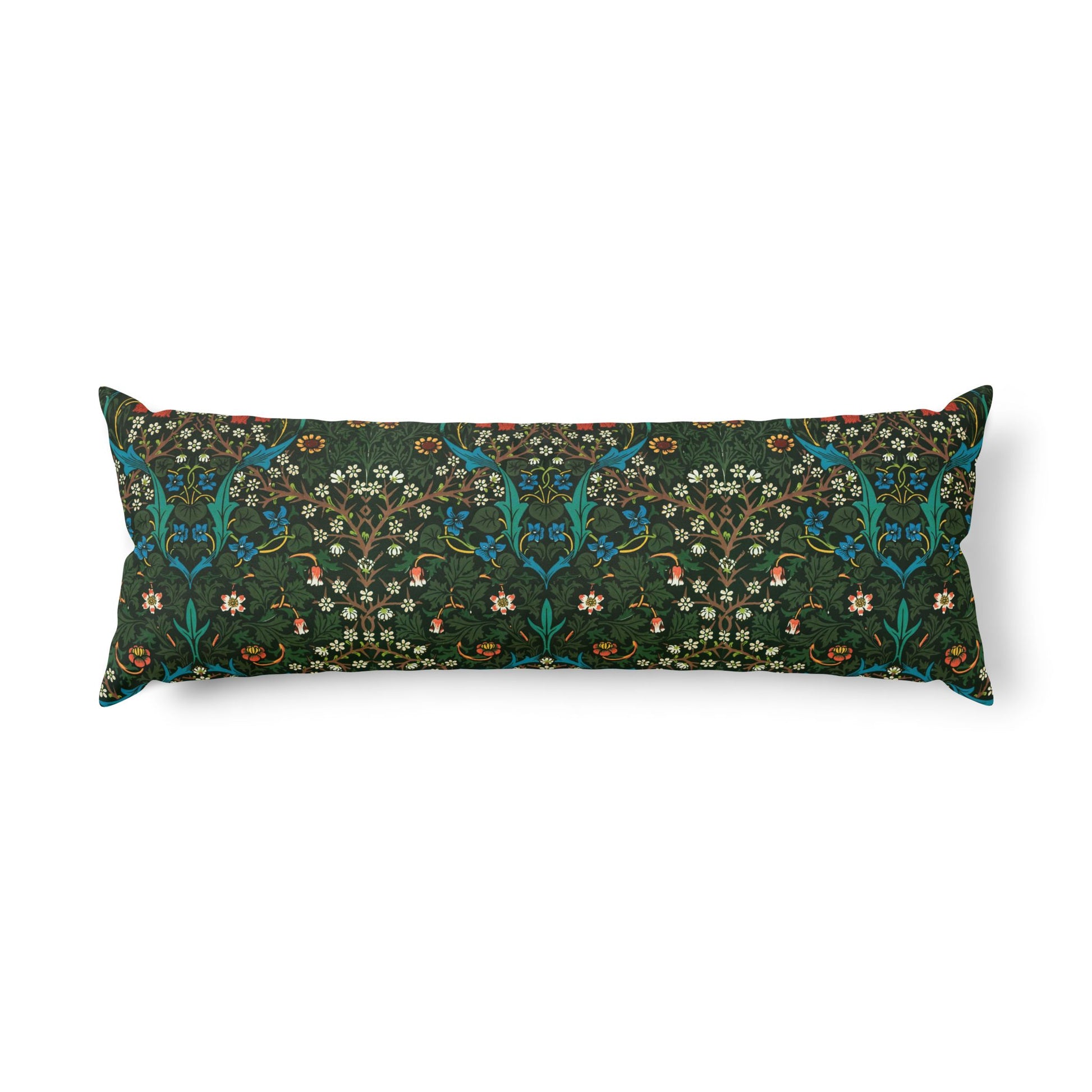 A long rectangular lumbar pillow featuring a dense floral and botanical pattern in dark green, teal, orange, and cream on a solid white background.