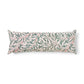 Long rectangular pillow with leaf pattern on a white background