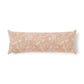 Long rectangular pillow with a floral pattern on a white background