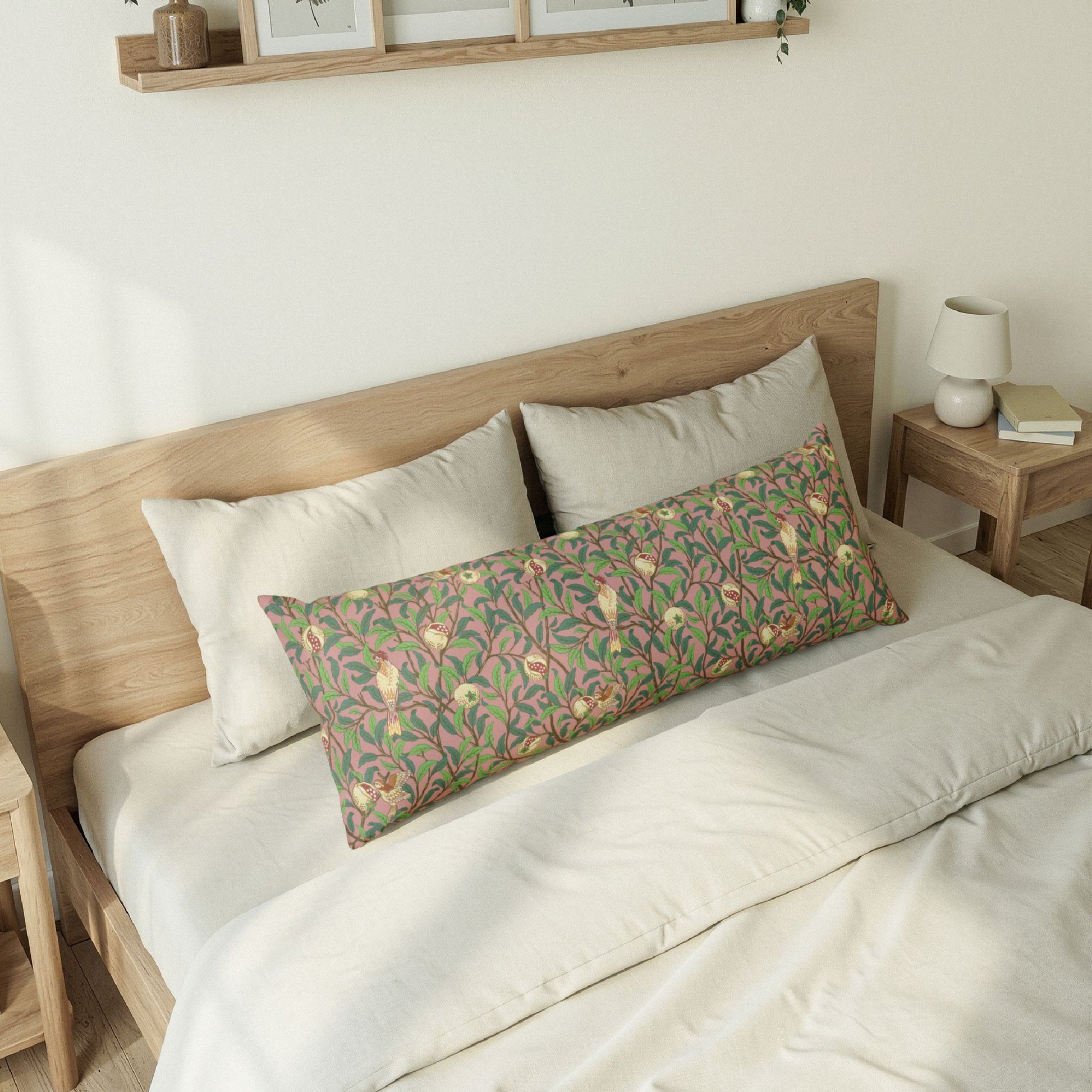 Bedroom with a wooden bed frame and decorative pillows