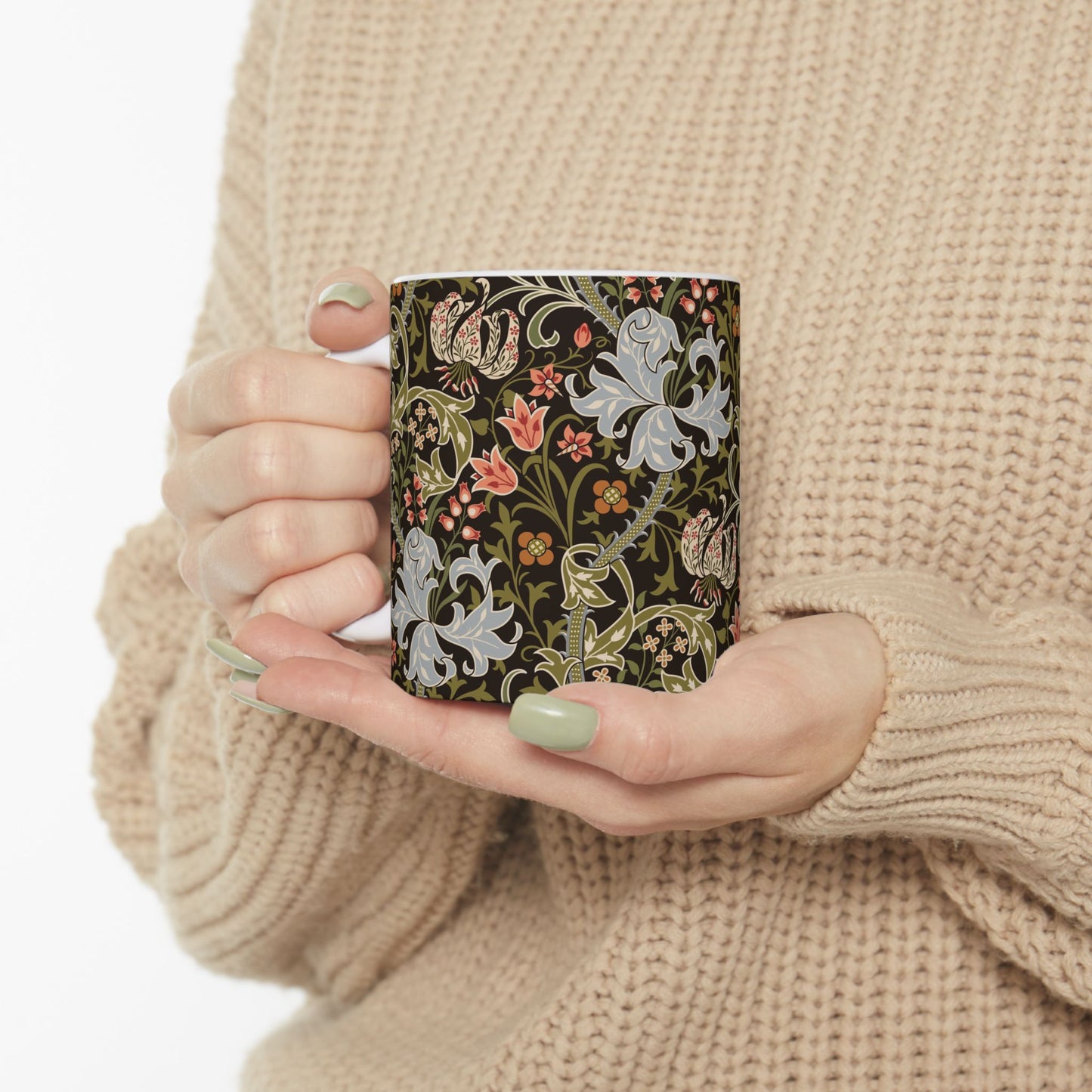 A ceramic mug with a floral pattern inspired by William Morris & Co - Golden Lily Collection in a midnight colour palette.