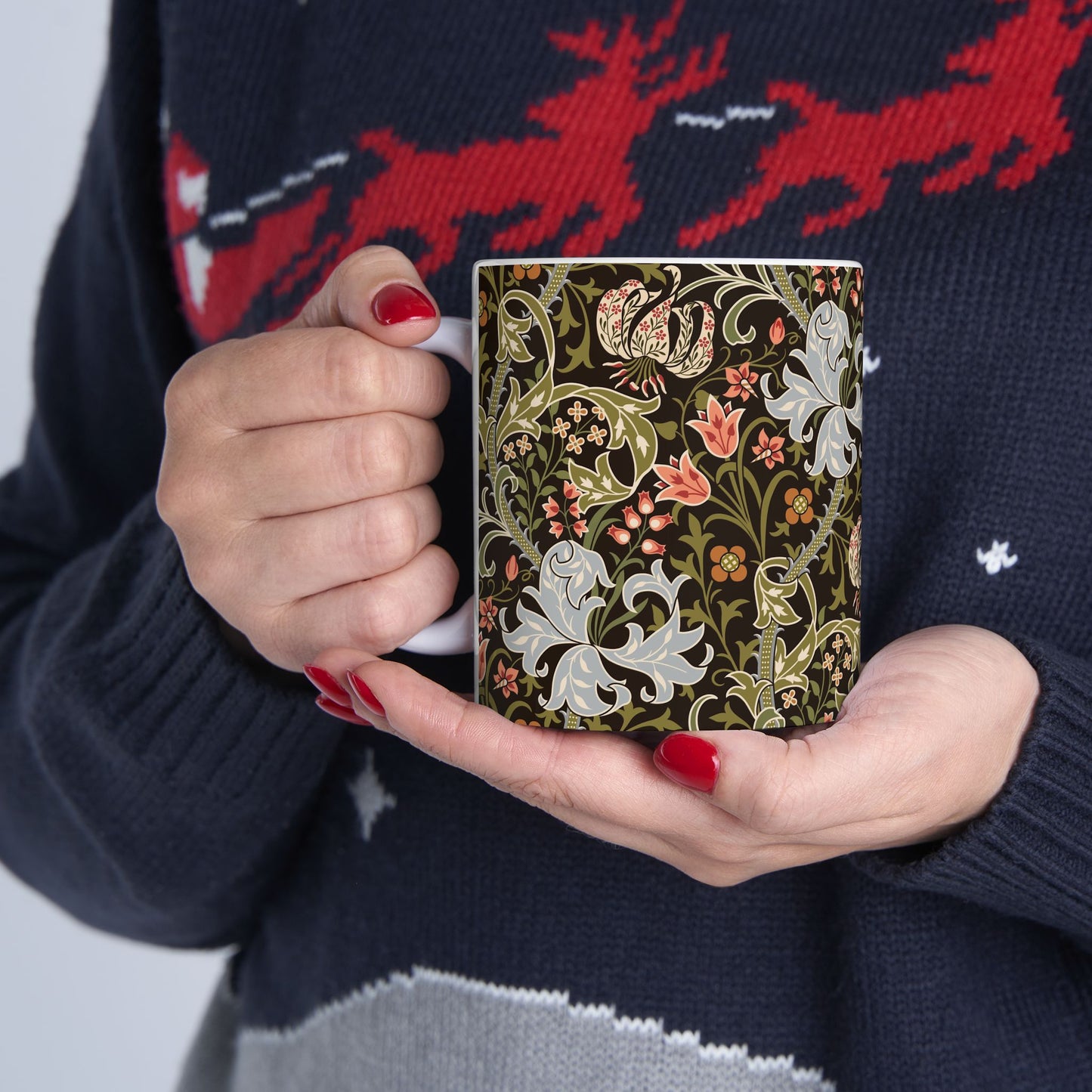 A ceramic mug with a floral pattern inspired by William Morris & Co - Golden Lily Collection in a midnight colour palette.