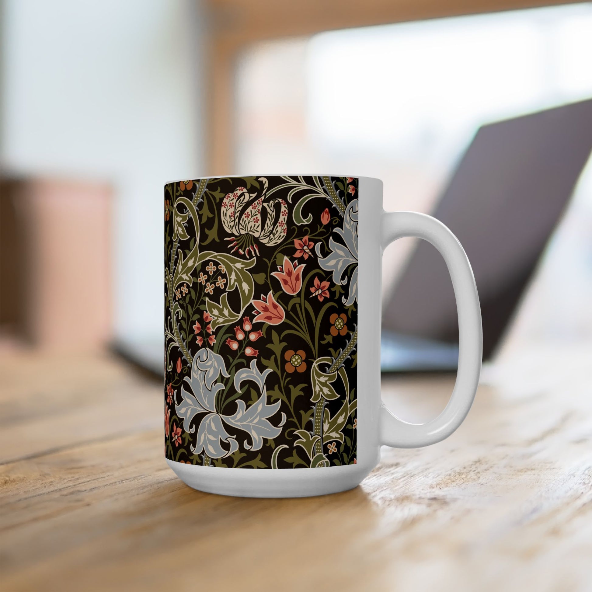 A ceramic mug with a floral pattern inspired by William Morris & Co - Golden Lily Collection in a midnight colour palette.