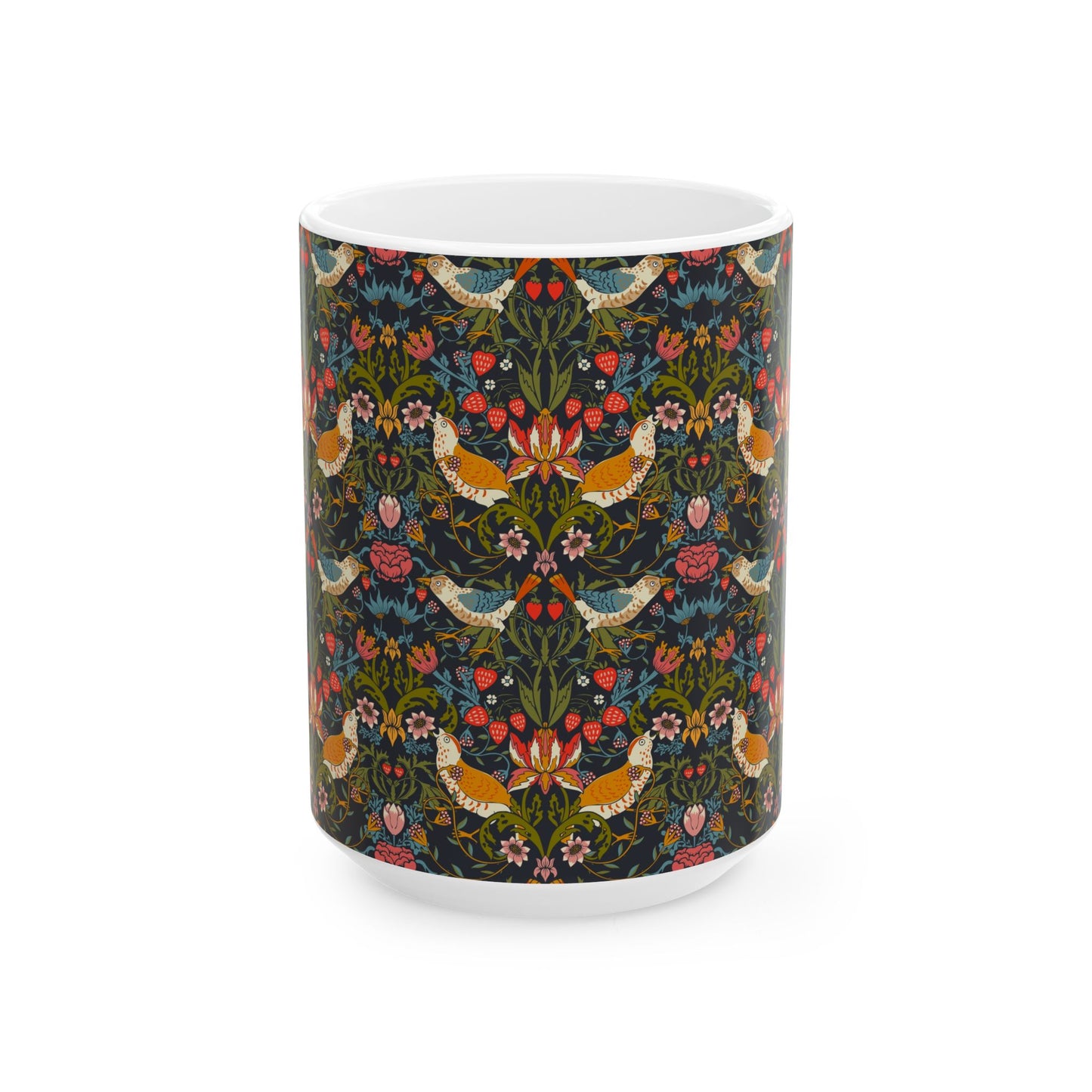 A ceramic mug with a colorful floral pattern and birds, inspired by William Morris' Strawberry Thief collection.