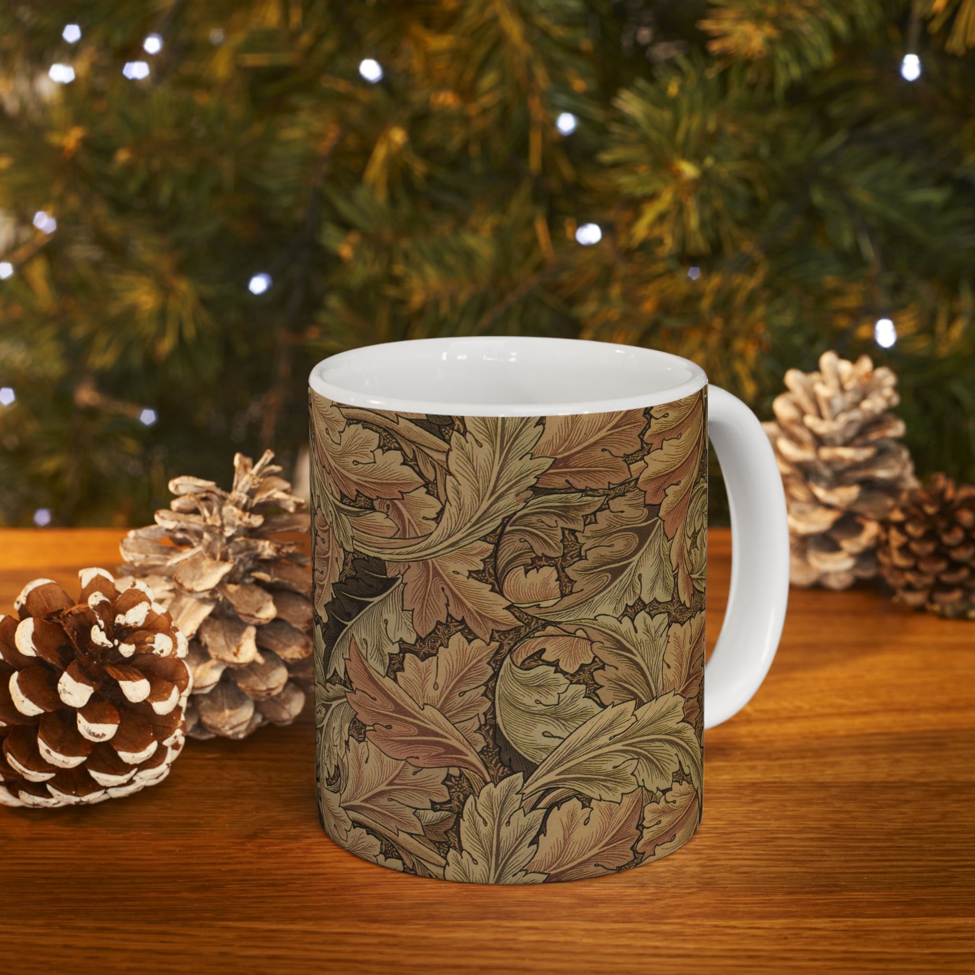 A ceramic mug with a brown and white geometric pattern inspired by William Morris - Acanthus Collection.