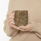 A ceramic mug with a brown and white geometric pattern inspired by William Morris - Acanthus Collection.