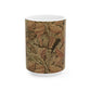 A ceramic mug with a brown and white geometric pattern inspired by William Morris - Acanthus Collection.