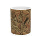 A ceramic mug with a brown and white geometric pattern inspired by William Morris - Acanthus Collection.
