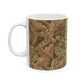 A ceramic mug with a brown and white geometric pattern inspired by William Morris - Acanthus Collection.
