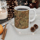 A ceramic mug with a brown and white geometric pattern inspired by William Morris - Acanthus Collection.