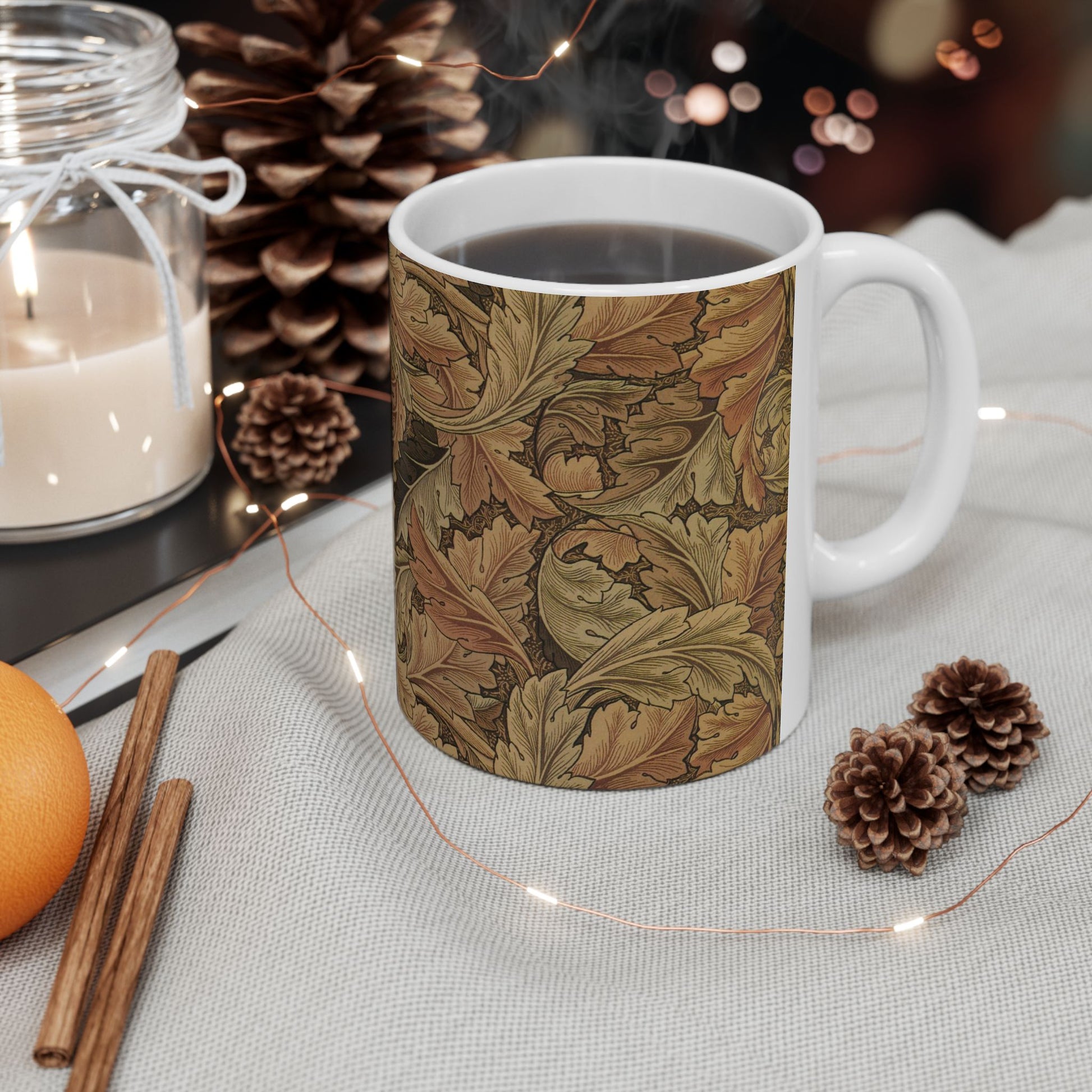 A ceramic mug with a brown and white geometric pattern inspired by William Morris - Acanthus Collection.