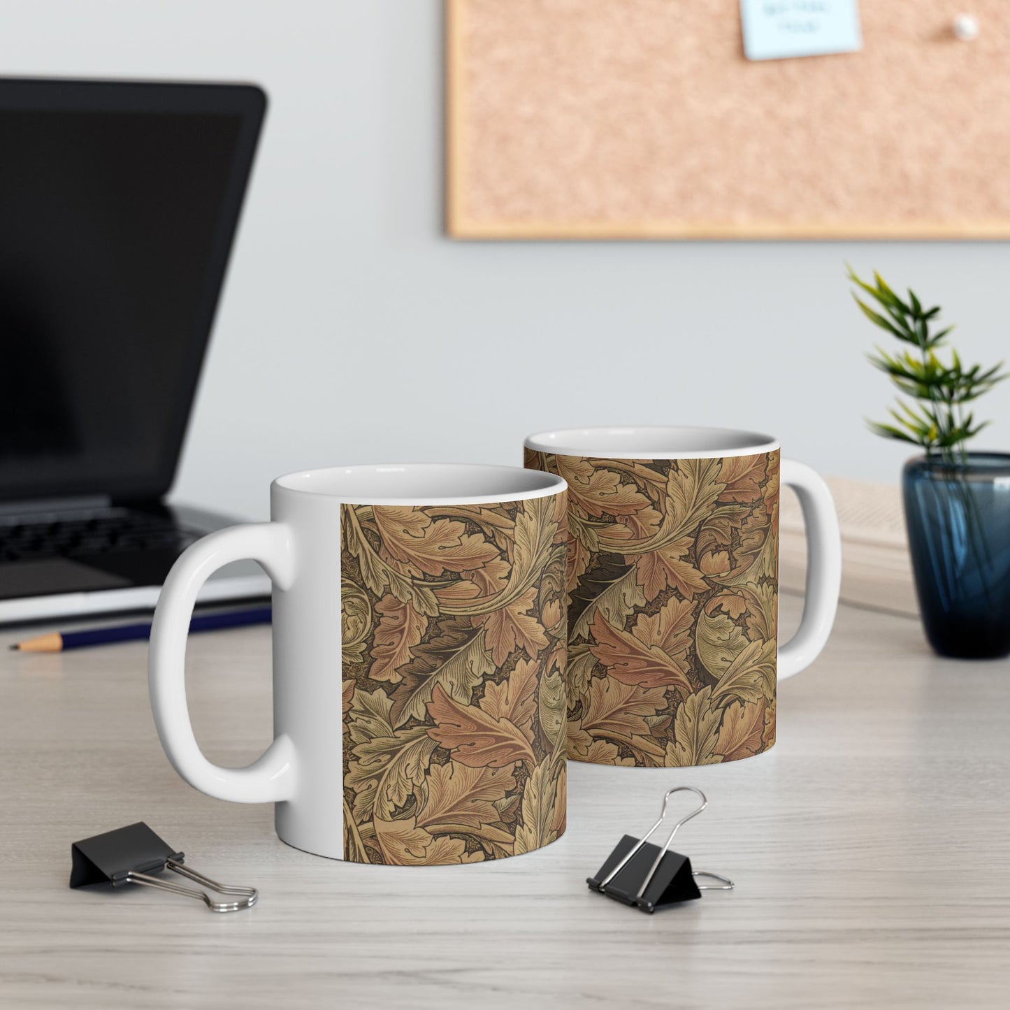 A ceramic mug with a brown and white geometric pattern inspired by William Morris - Acanthus Collection.