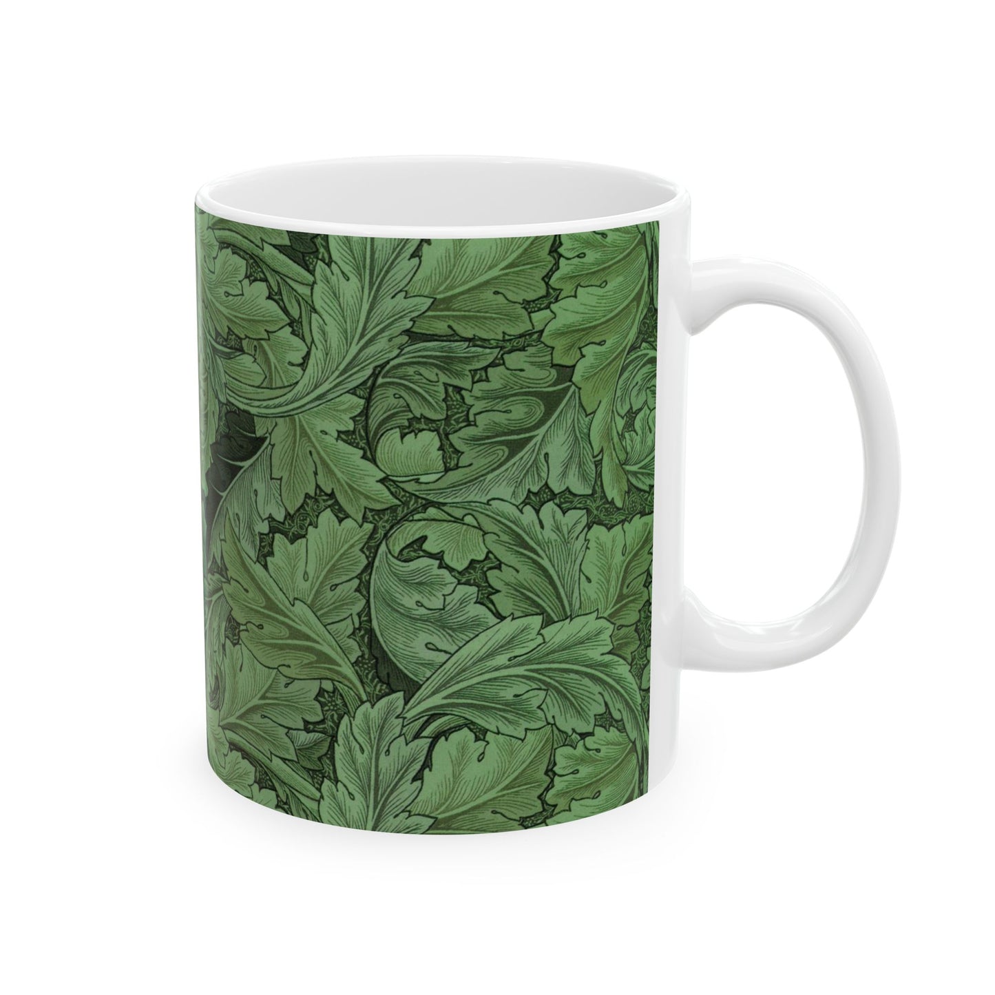 A ceramic mug with a green and white leaf pattern inspired by William Morris - Acanthus Collection.