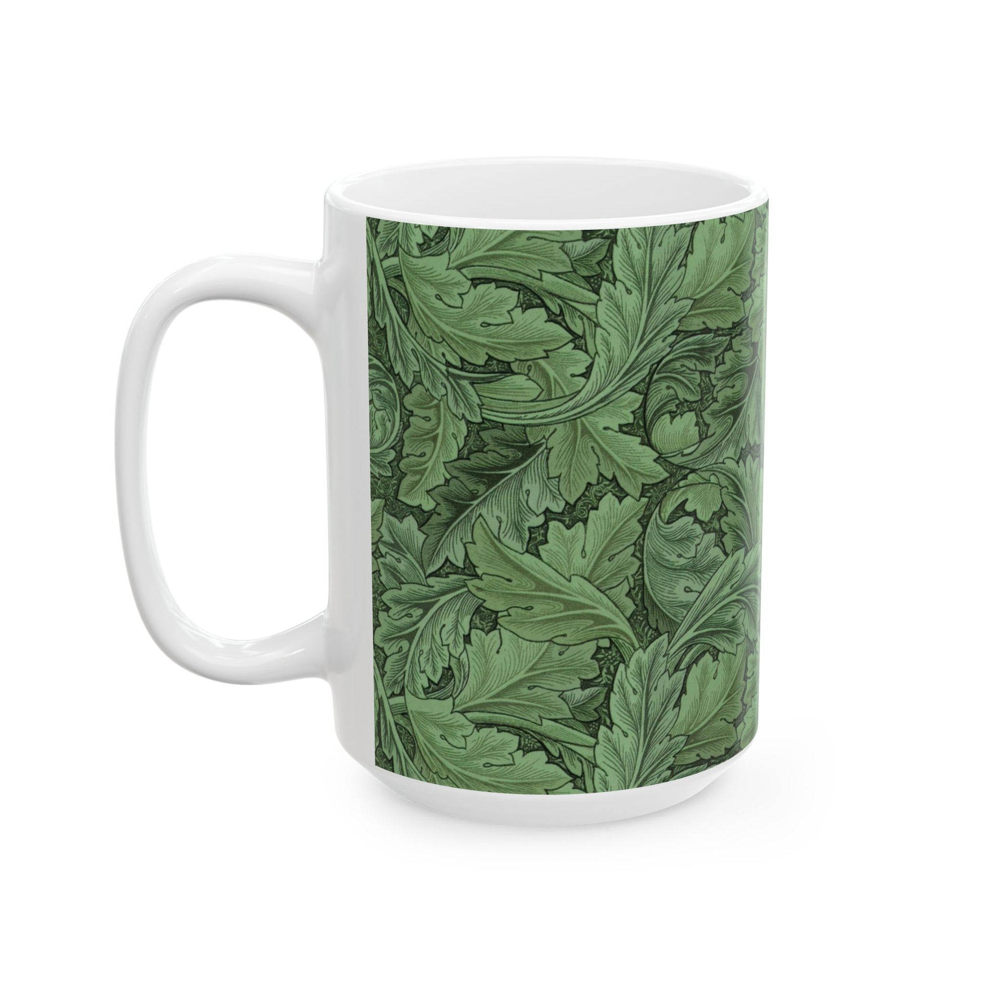 A ceramic mug with a green and white leaf pattern inspired by William Morris - Acanthus Collection.