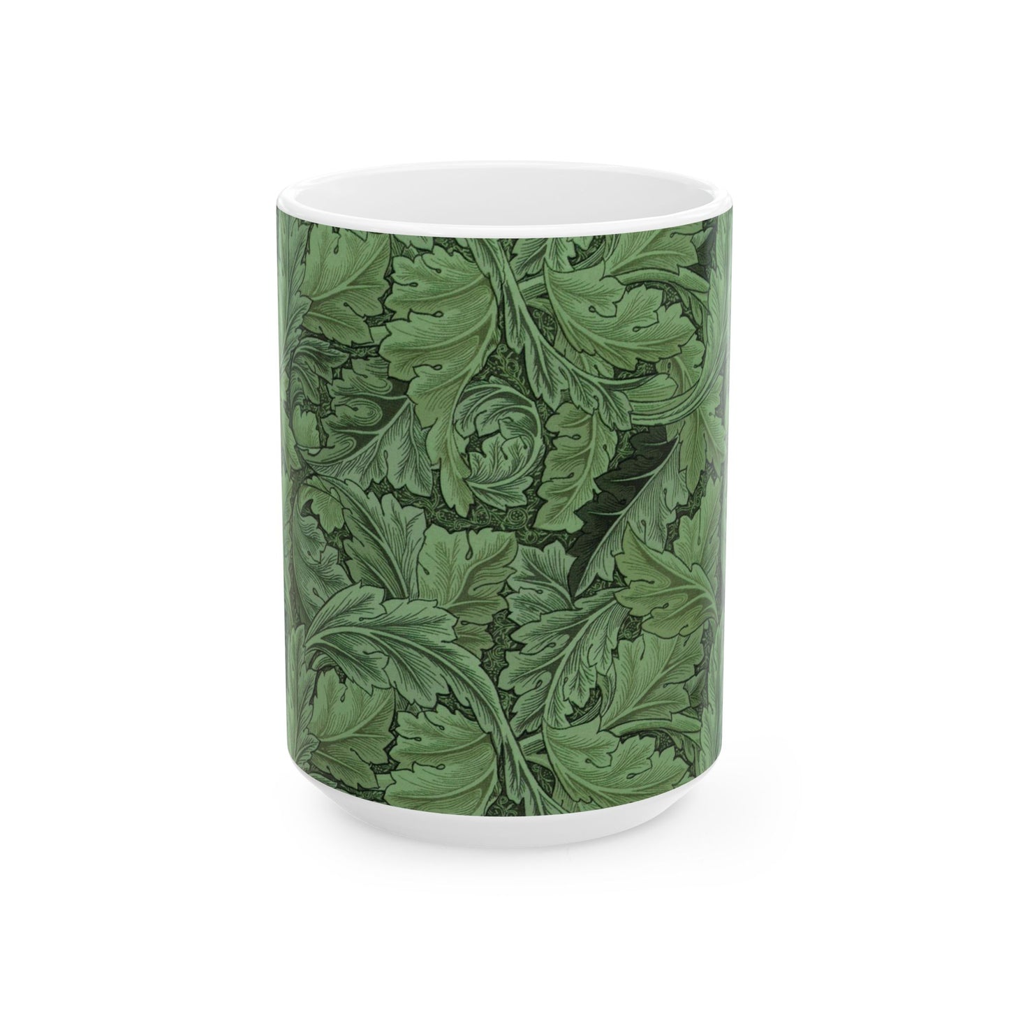 A ceramic mug with a green and white leaf pattern inspired by William Morris - Acanthus Collection.
