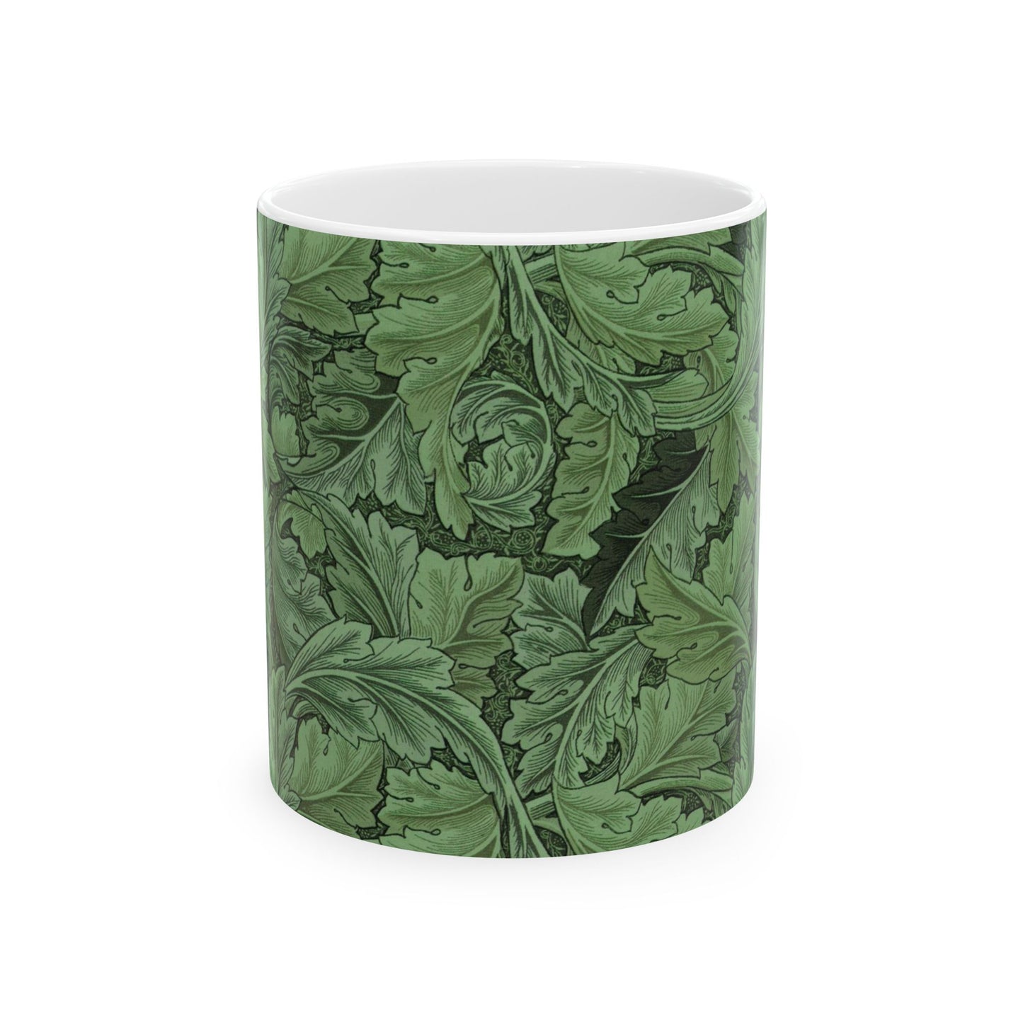 A ceramic mug with a green and white leaf pattern inspired by William Morris - Acanthus Collection.